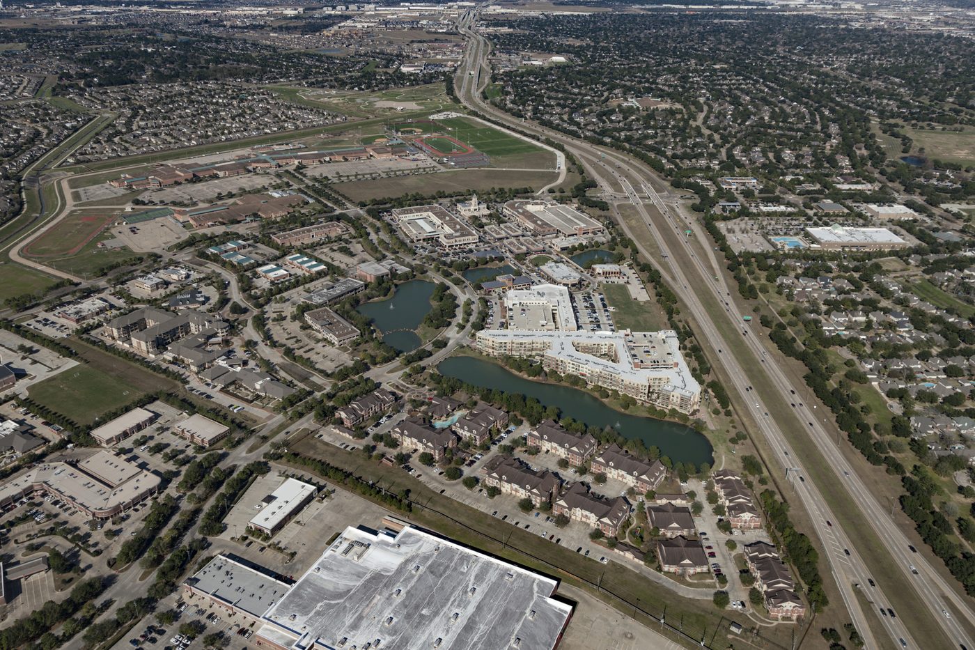 LaCenterra is located on the west side of the Grand Parkway, also known as Highway 99.