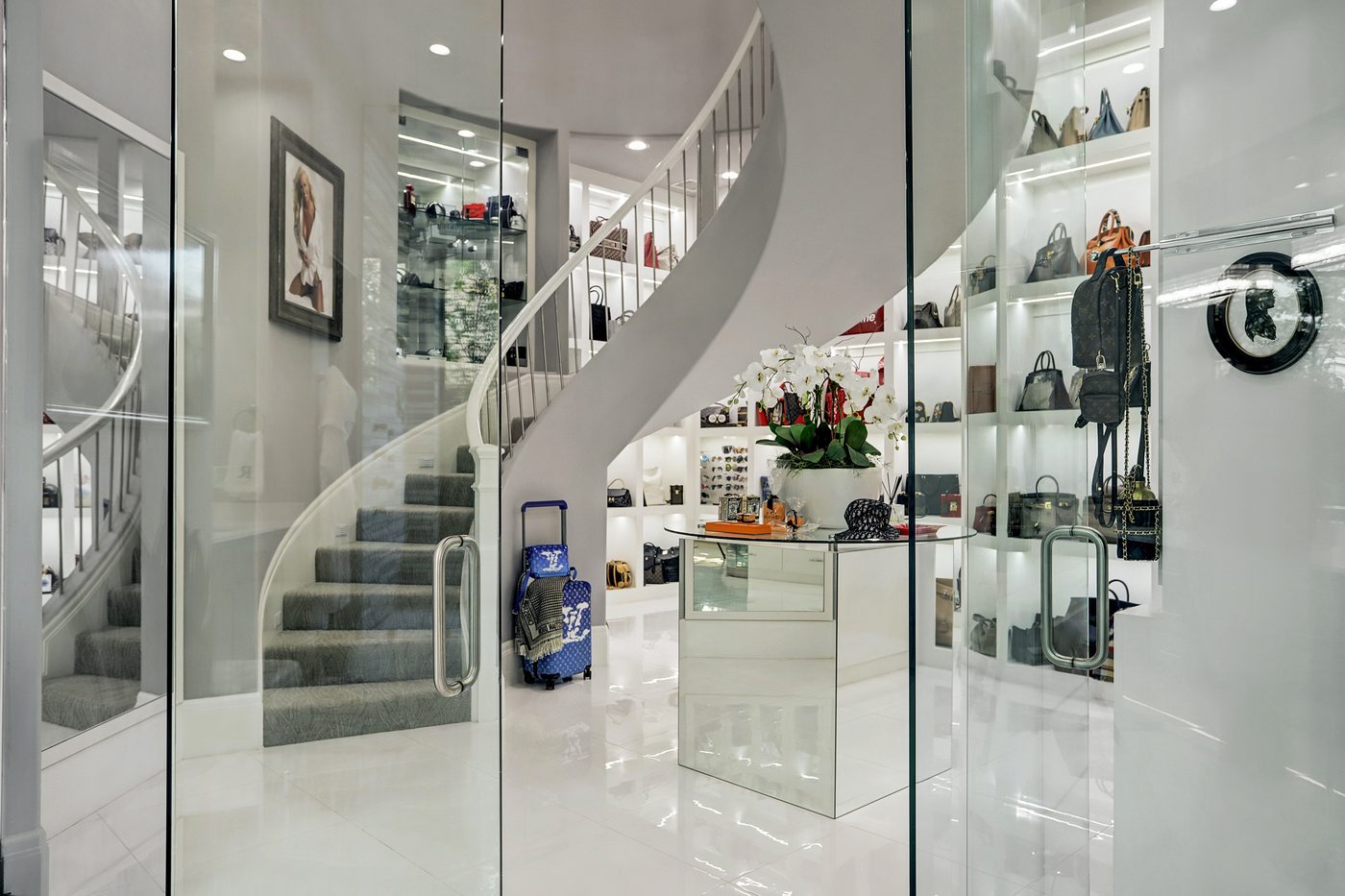 Three Story Closet Delivers Max Wardrobe Space at Mansion