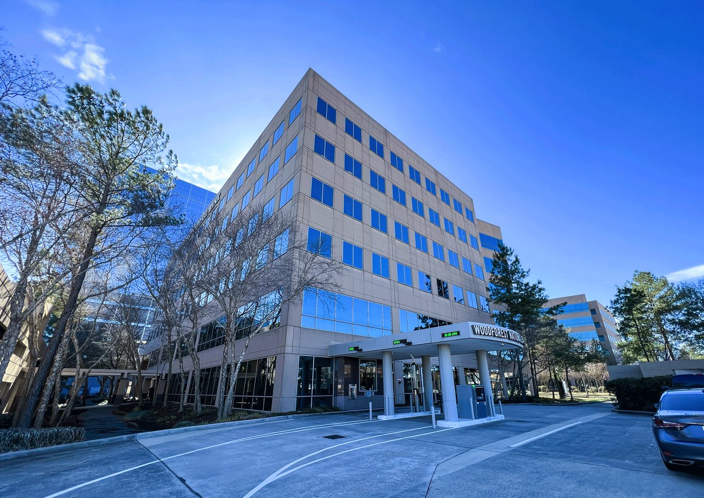 Woodforest Bank Buys Buildings